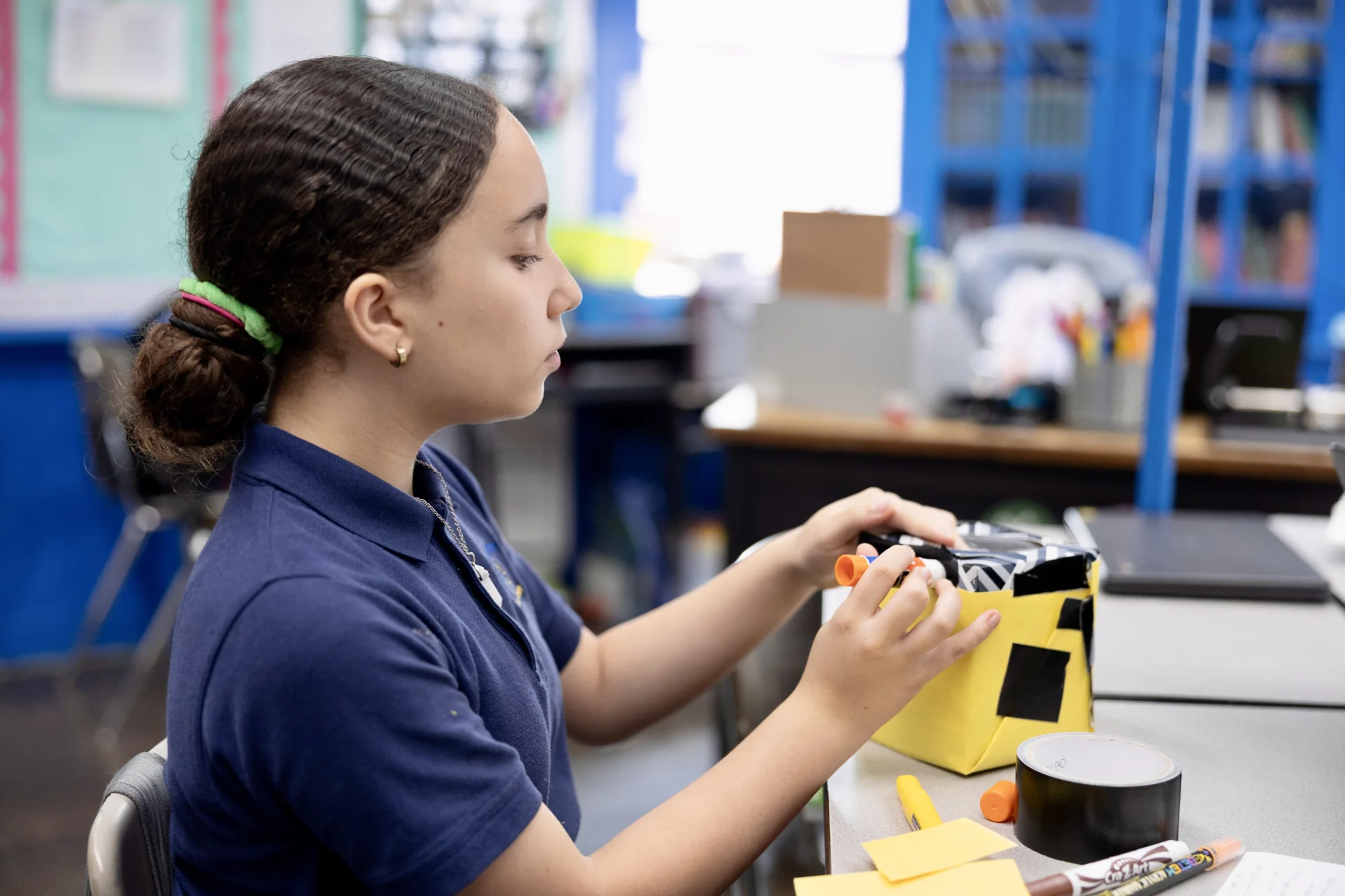 student working on a project