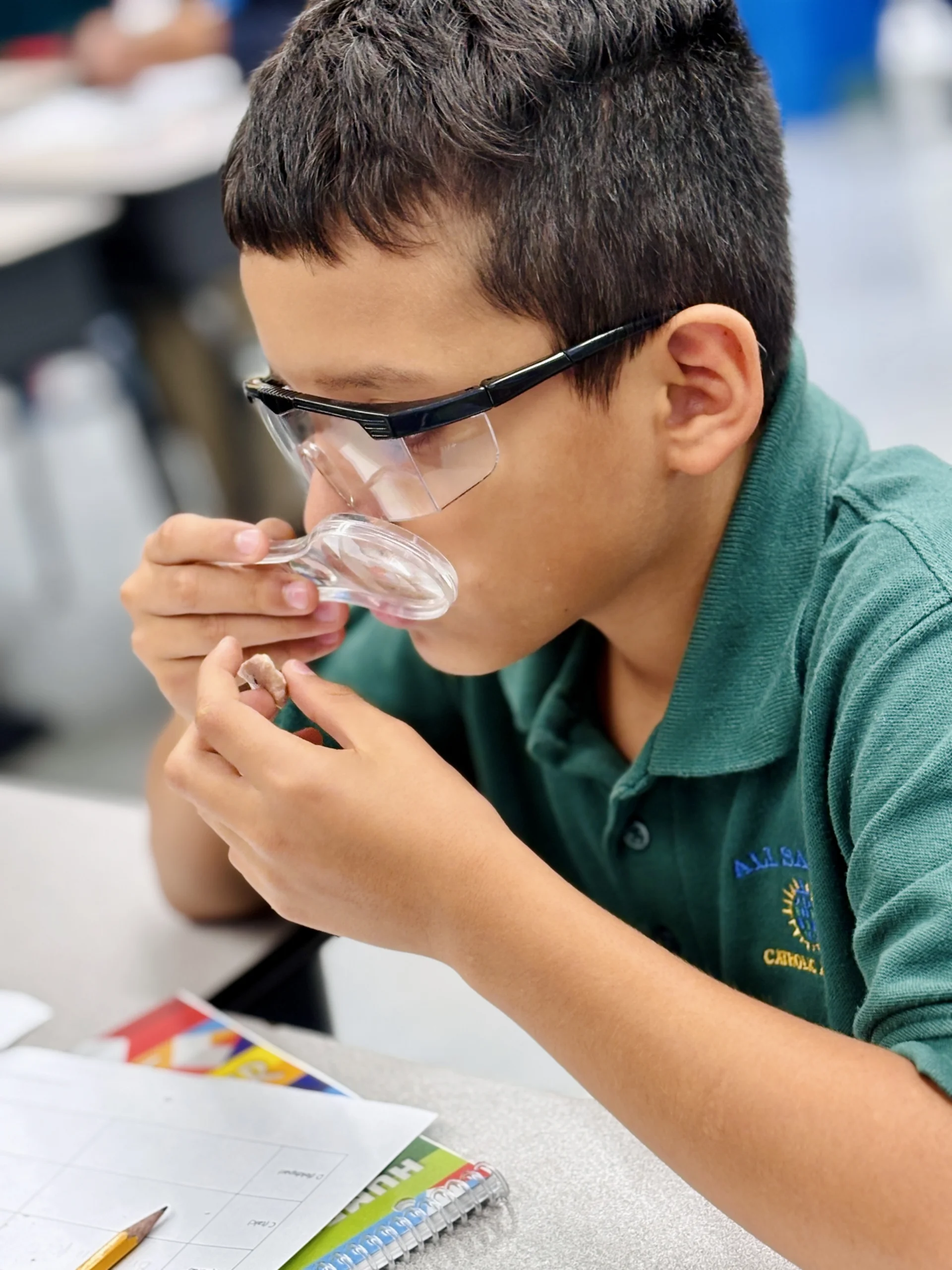 student using magnifying glass